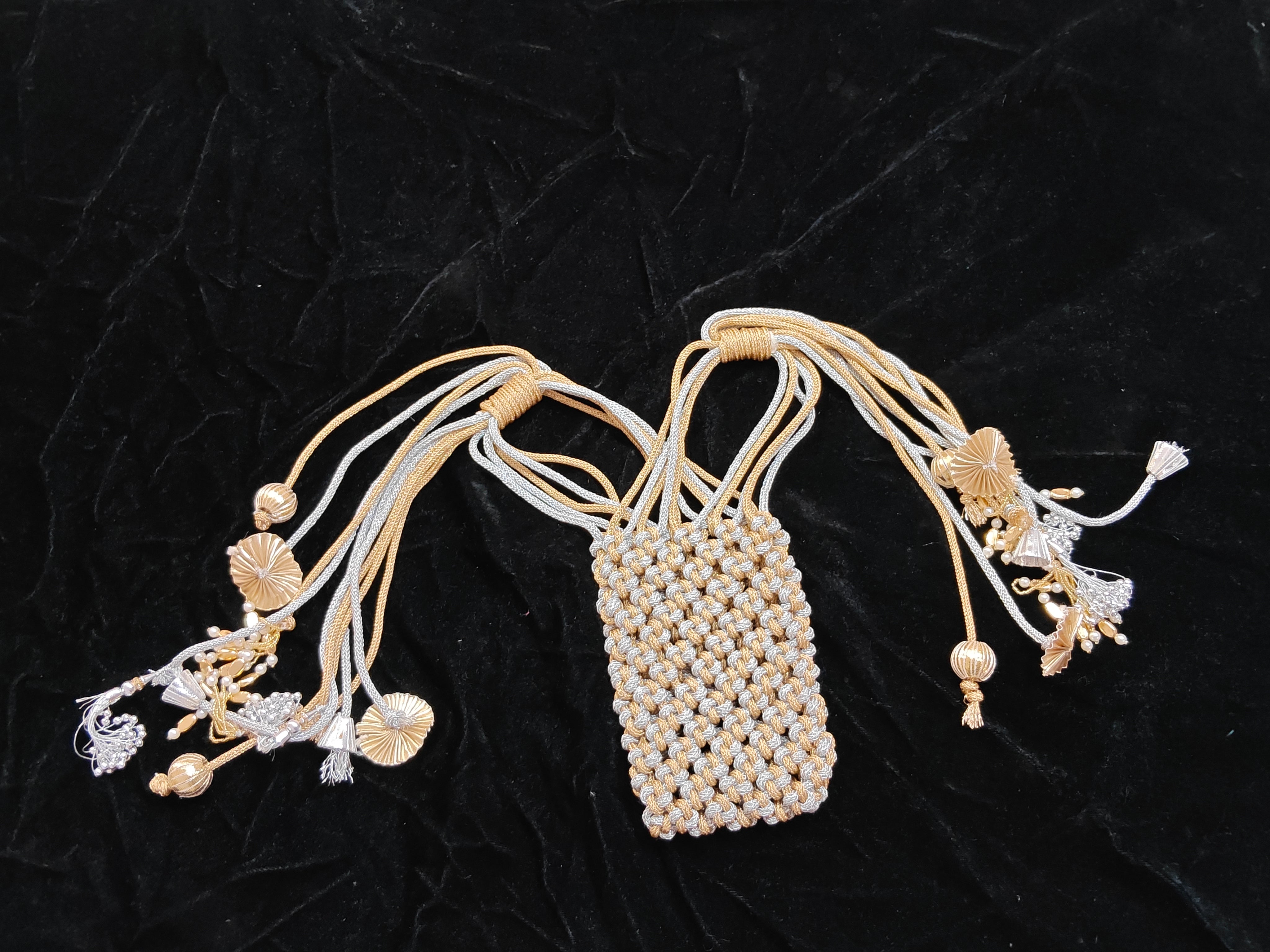 D 16 Elegant Handcrafted Potli Purse for Women, Silver & pure Gold Colour.