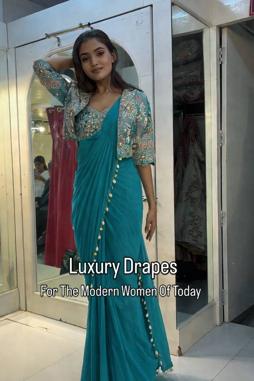 green saree with mirror work blouse and coin border