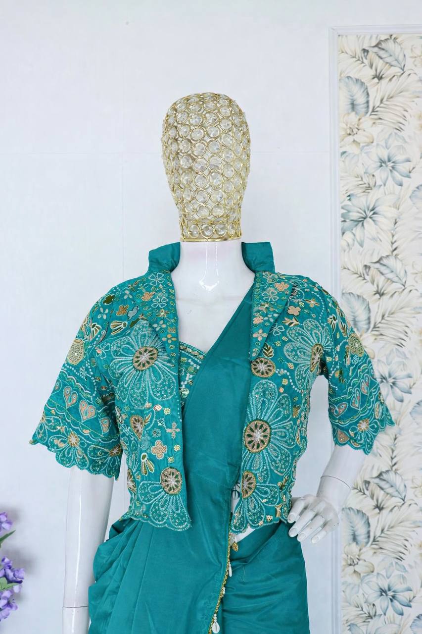 green saree with mirror work blouse and coin border