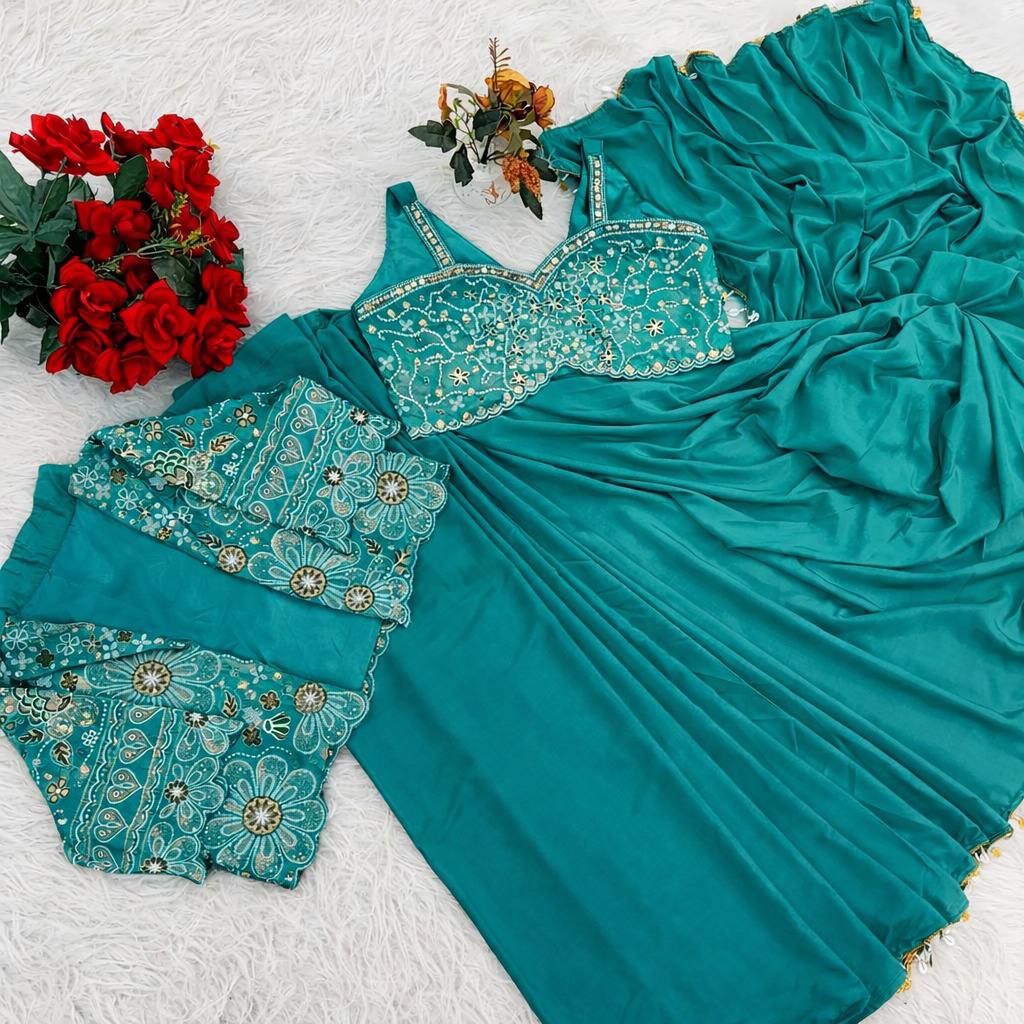green saree with mirror work blouse and coin border