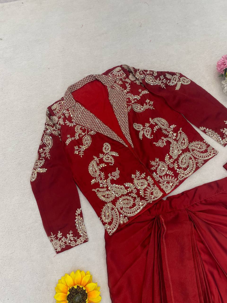 Red outfit with intricate gold embroidery design